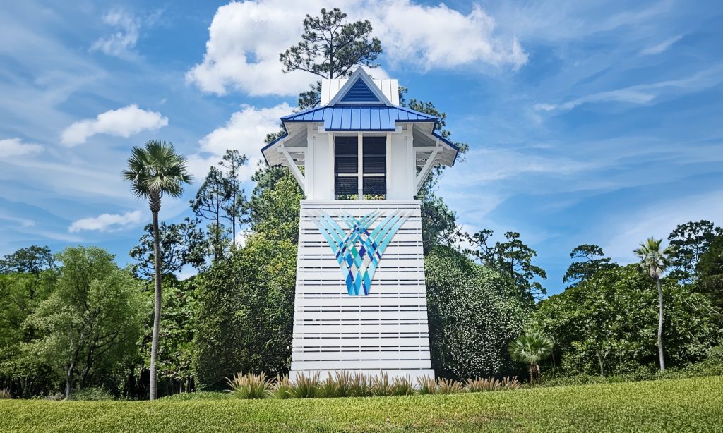Diamond Springs entrance tower with the community logo