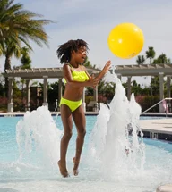 girl-playing-yellow-ball